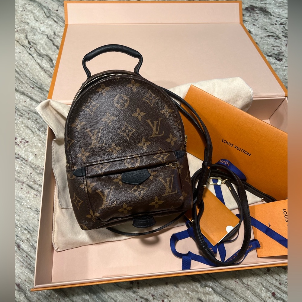New condition Louis Vuitton Palm Springs mini.Full set/accessories
